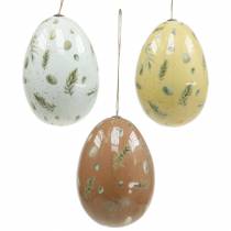 Akasztható húsvéti tojás motívummal és tollal fehér, barna, sárga válogatott 3db
