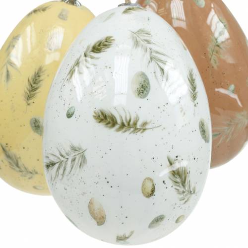tételeket Akasztható húsvéti tojás motívummal és tollal fehér, barna, sárga válogatott 3db