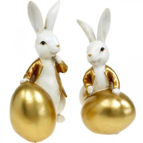 Floristik24 Húsvéti nyuszi fehér-arany, húsvéti dekoráció, dekoratív nyuszi tojással H16/18cm 2db szett