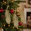 Dekoratív tollak, fadíszek csillámmal, adventi díszek, akasztható tollak arany L22cm 12db | Floristik24.hu