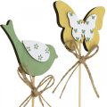 Floristik24 Plug madár pillangó, fa dekoráció, növény dugó rugós dekoráció zöld, sárga L24/25cm 12db